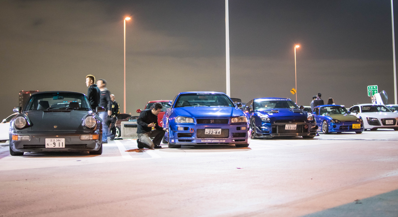 Illustration for article titled This Parking Lot In Tokyo Will Bring All Your Car Fantasies To Life